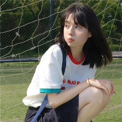 照片的她